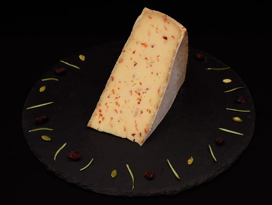 Raclette au piment, fromage à raclette mi-dur de Savoie