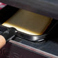 Raclette fumée de Haute-Savoie, tranche qui fond sous l'appareil à raclette
