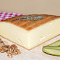 Raclette fumée de Haute-Savoie, demi-meule entamée, autre vue