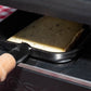 Raclette de Savoie au poivre, tranche qui fond sous l'appareil à raclette