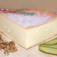 Raclette de Savoie, demi-meule entamée, autre vue