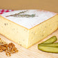 Raclette à la truffe, demi-meule entamée, autre vue