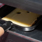 Raclette au vin blanc, tranche qui fond sous l'appareil à raclette